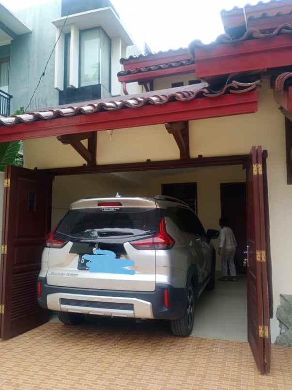 rumah coklat jawa jatibening indah