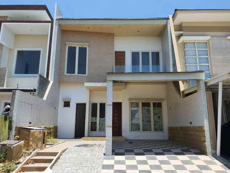 rumah pakuwon city imperial beach minimalis strategis