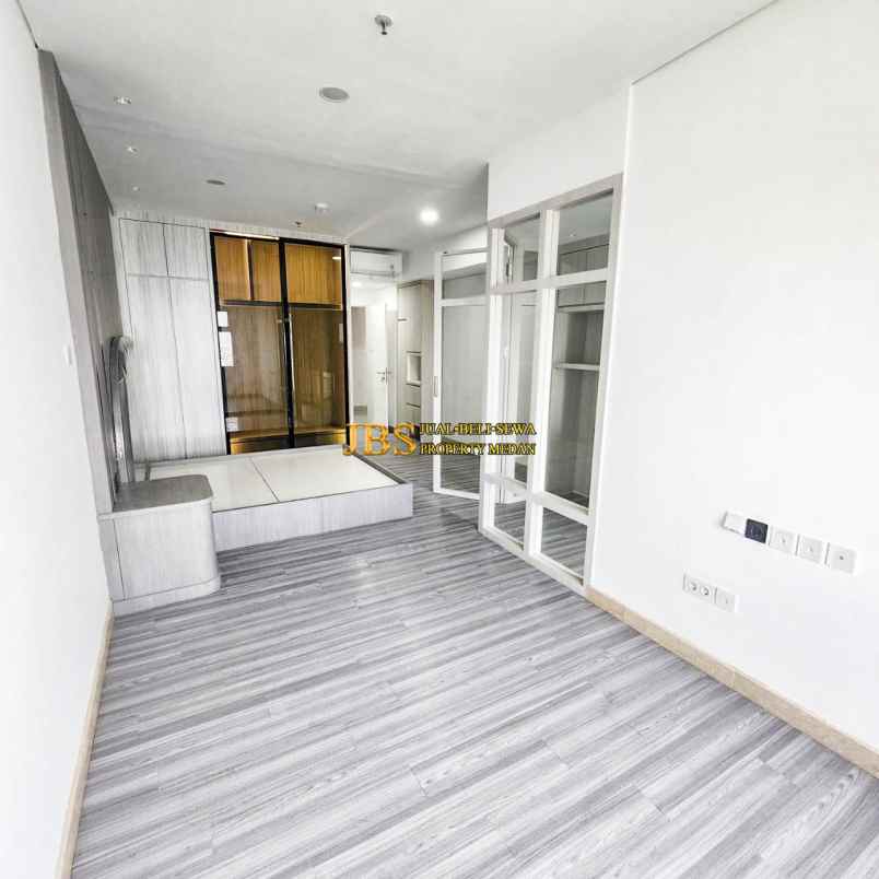 dijual apartemen podomoro city deli tower