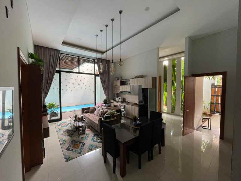 dijual rumah ceger cipayung tropis modern minimalis