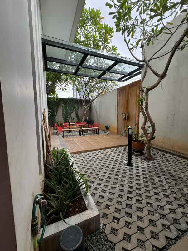 dijual rumah ceger cipayung tropis modern minimalis