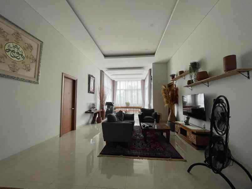 dijual rumah ceger cipayung tropis modern minimalis