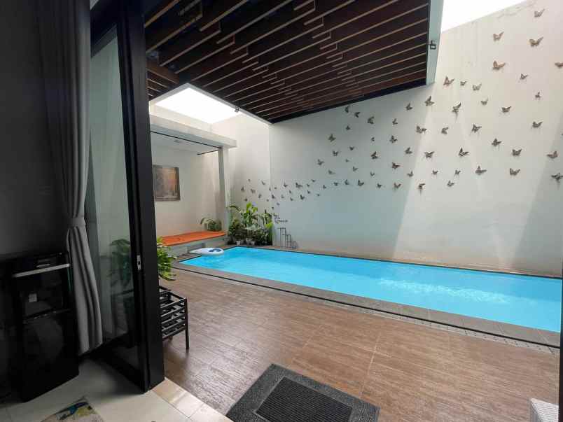 dijual rumah ceger cipayung tropis modern minimalis