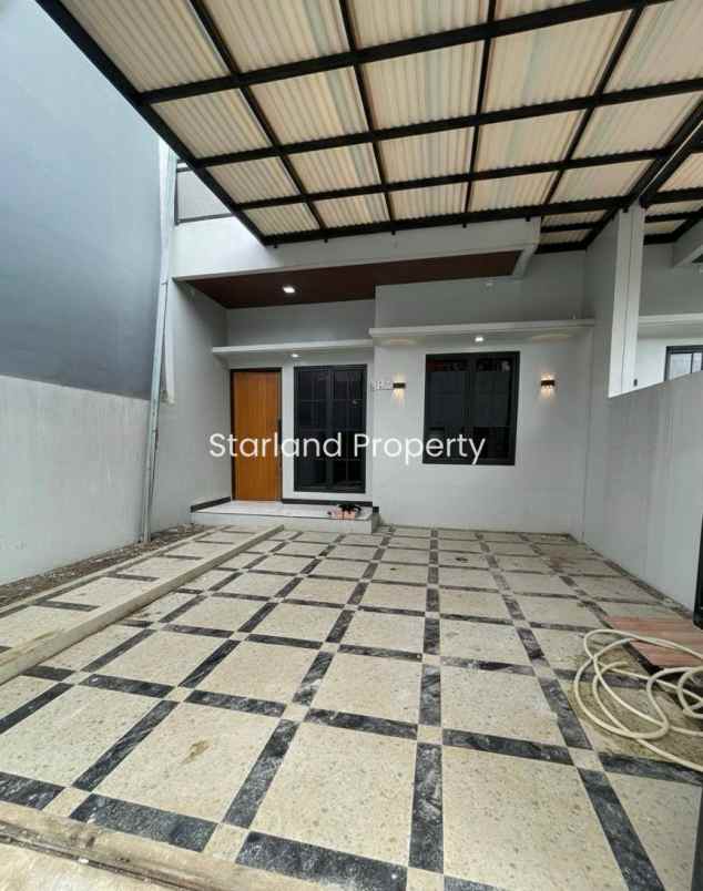dijual rumah graha raya