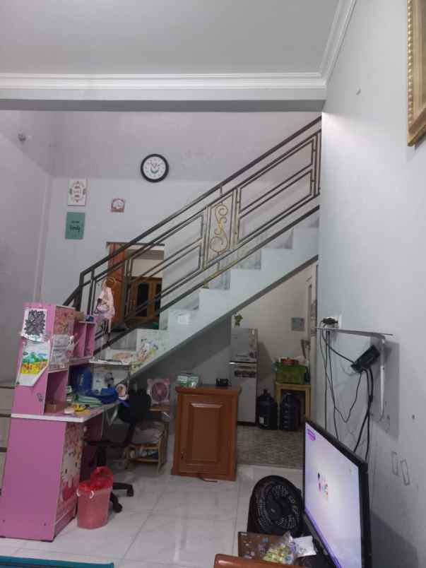 dijual rumah jalan raya mustikajaya