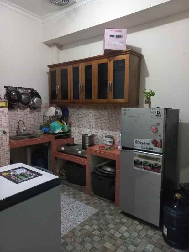 dijual rumah jalan raya mustikajaya