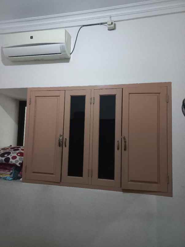 dijual rumah jalan raya mustikajaya