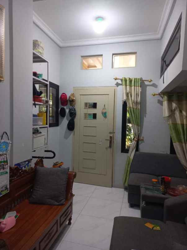 dijual rumah jalan raya mustikajaya