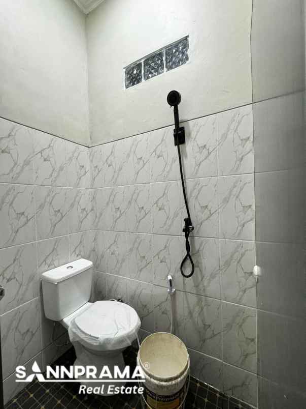 dijual rumah rangkapan jaya