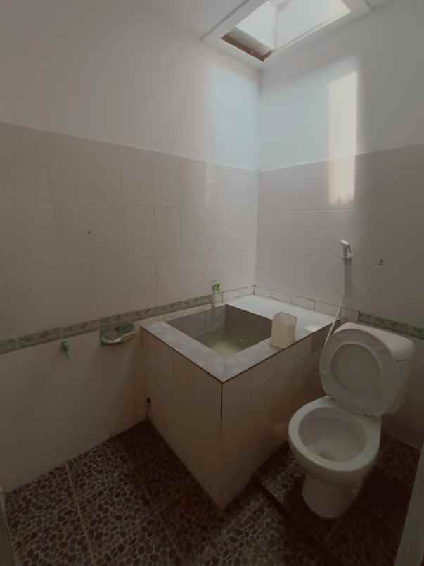 dijual rumah taman harapan baru