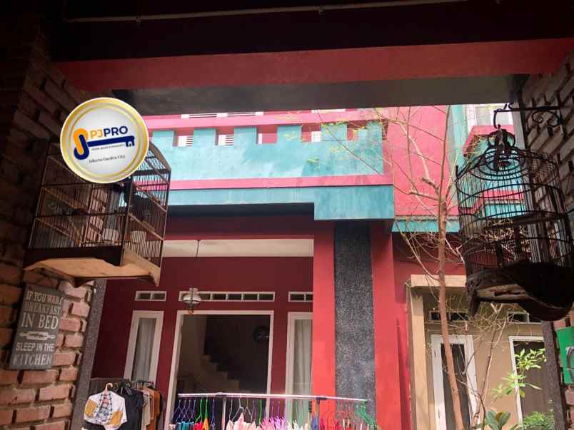 dijual rumah taman harapan baru