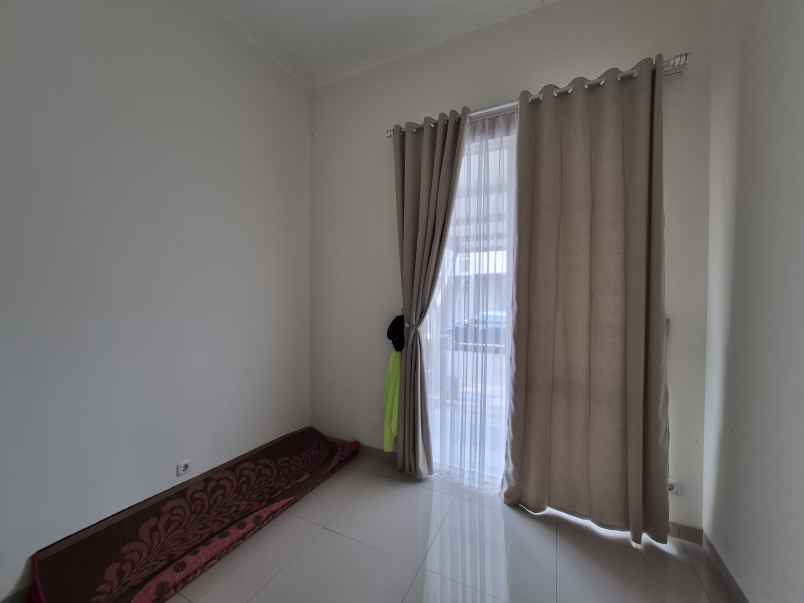 disewakan rumah suvarna sutera cluster