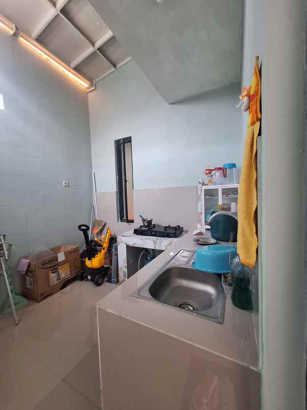 oper kredit rumah 90jt di the oso merr surabaya