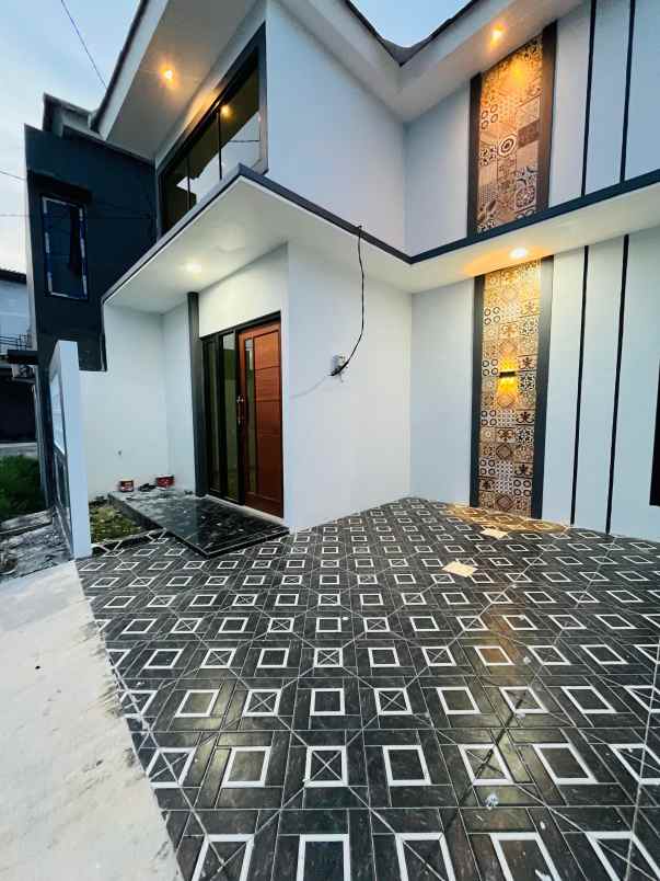 rumah minimalis dibatas kota surabaya barat