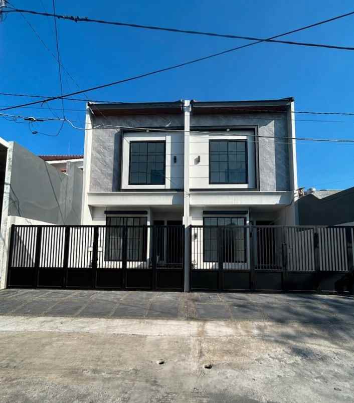 rumah wisma mukti new minimalis row 3 mobil carport 2