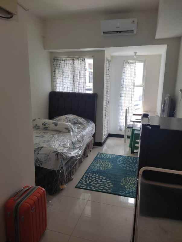 sewa apartemen amor pakuwon city studio
