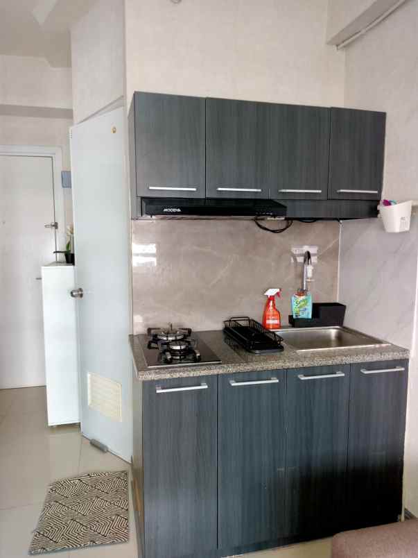 sewa apartment green pramuka city bangunan diatas mall