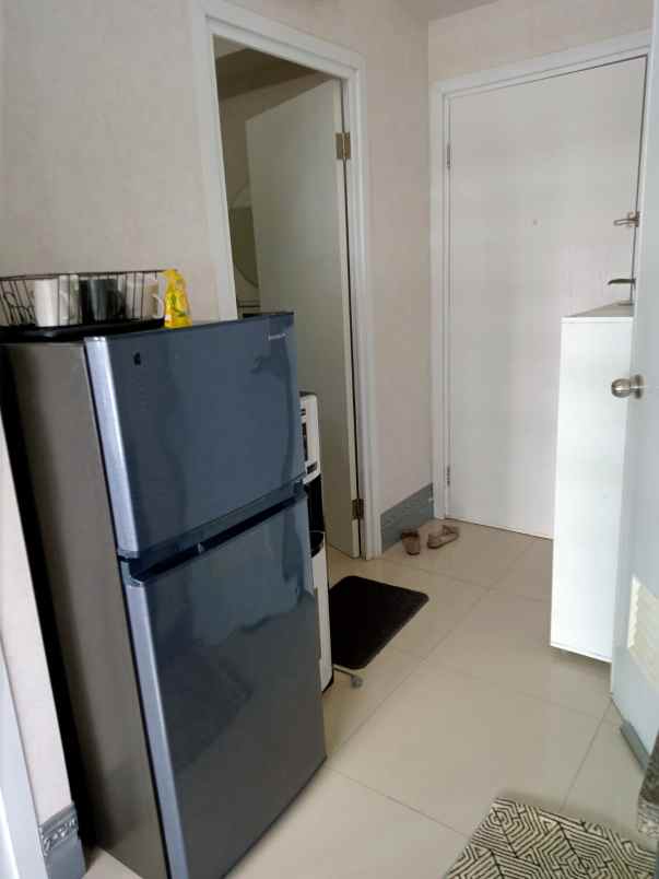 sewa apartment green pramuka city bangunan diatas mall