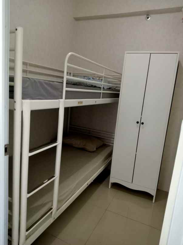 sewa apartment green pramuka city bangunan diatas mall