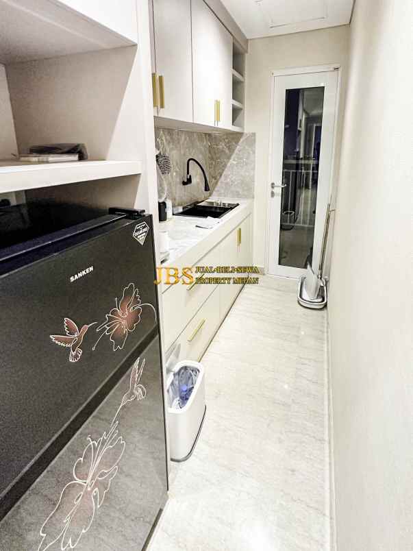 dijual apartemen podomoro city deli tower