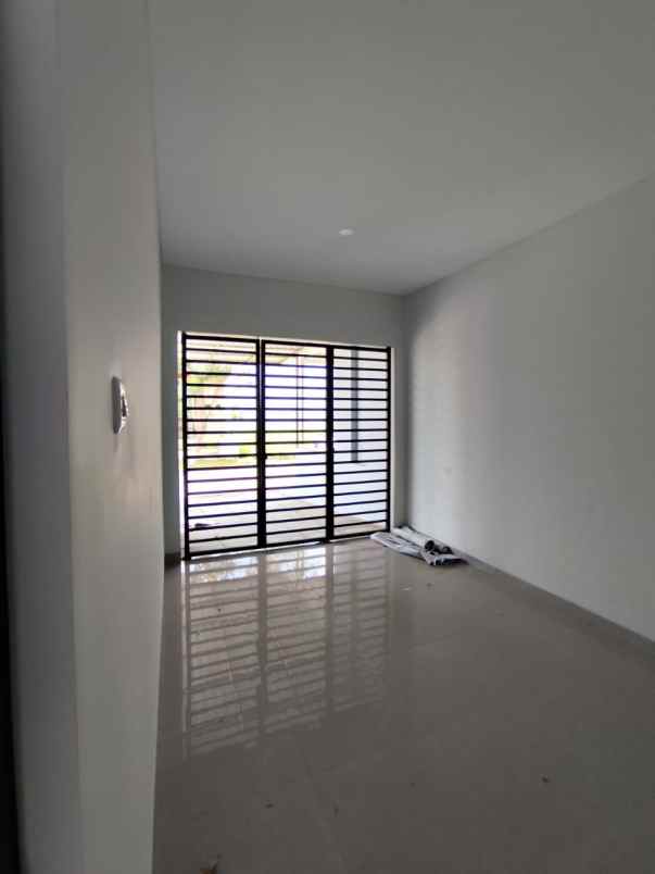 dijual rumah citraland raffles garden