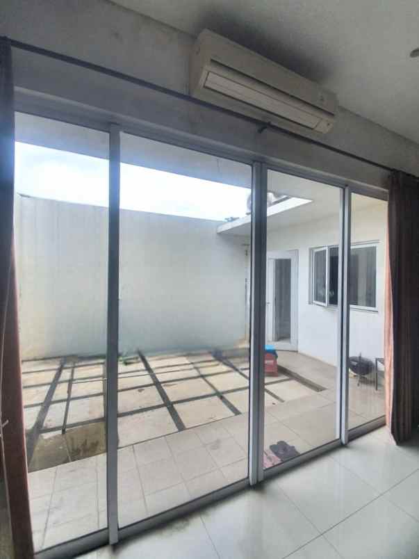 dijual rumah cluster palm spring jgc
