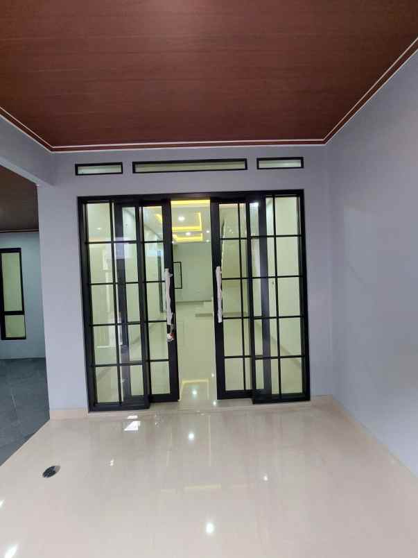 dijual rumah jalan raya buana gardenia