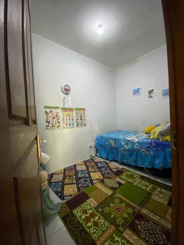 dijual rumah jl usman dehir