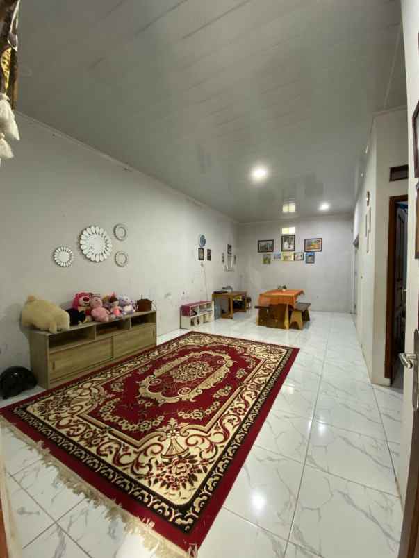 dijual rumah jl usman dehir