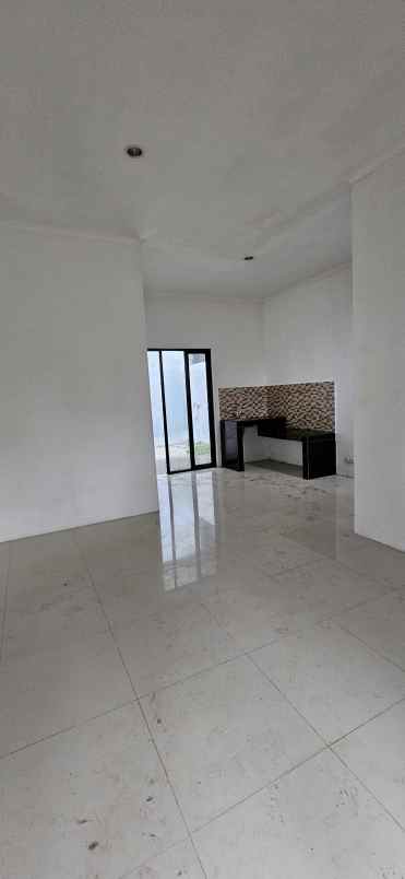 dijual rumah perum green depok village