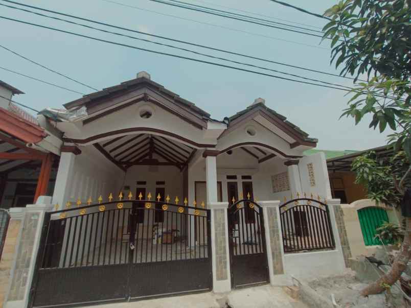 dijual rumah taman harapan baru