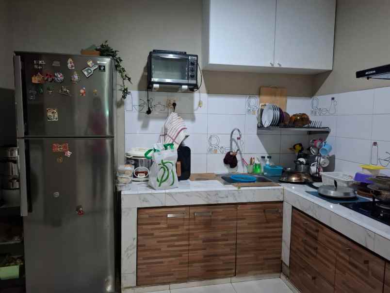 dijual rumah taman modern