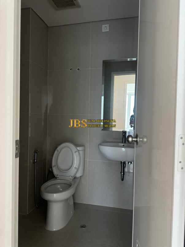 jual premium apartemen podomoro city deli tower empire