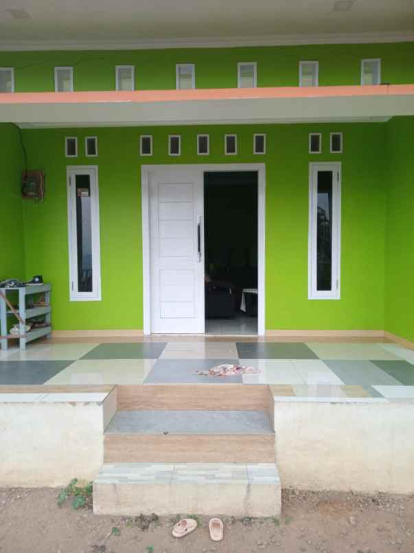 jual rumah masih baru 18 bulan