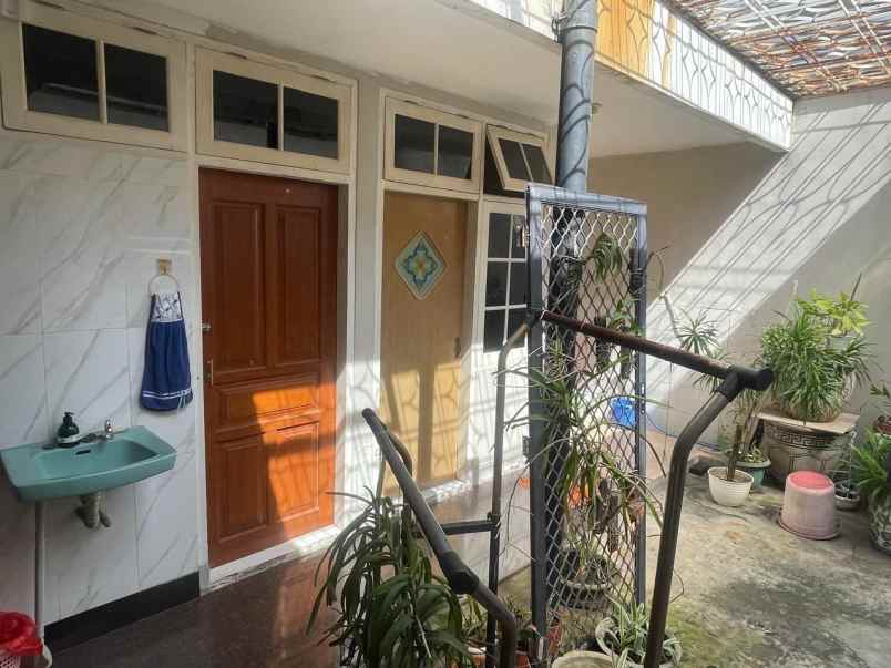rumah dharmahusada indah utara row 3 mobil