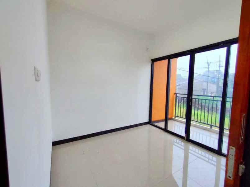 rumah murah depok nempel jalan raya