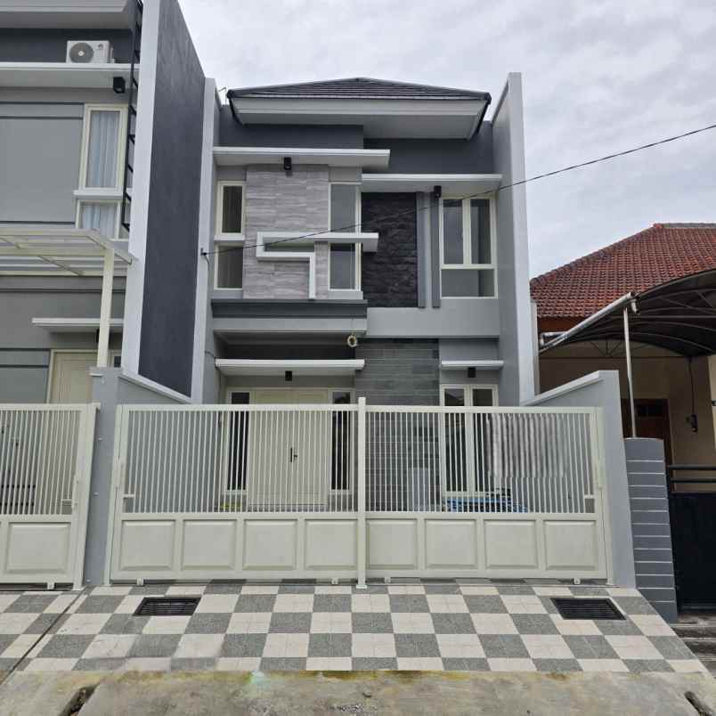 rumah nginden intan timur new minimalis row 3 mobil
