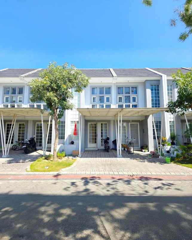 rumah queensland grand pakuwon minimalis siap huni