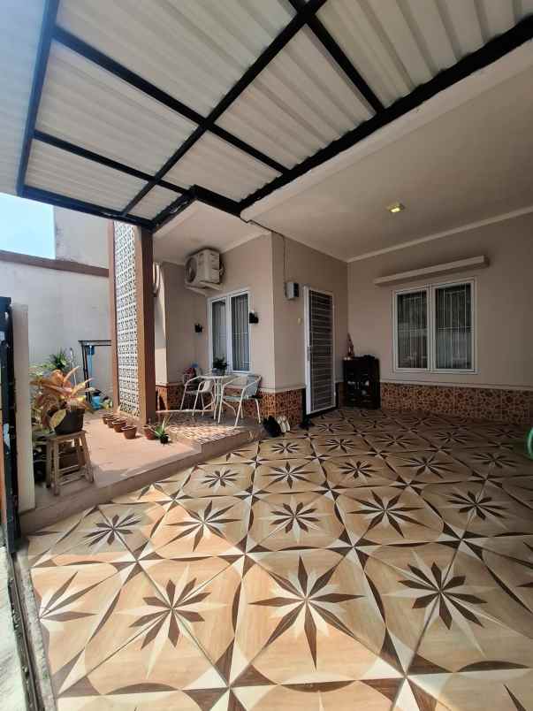 rumah semi furnished dalam cluster di jatimurni bekasi