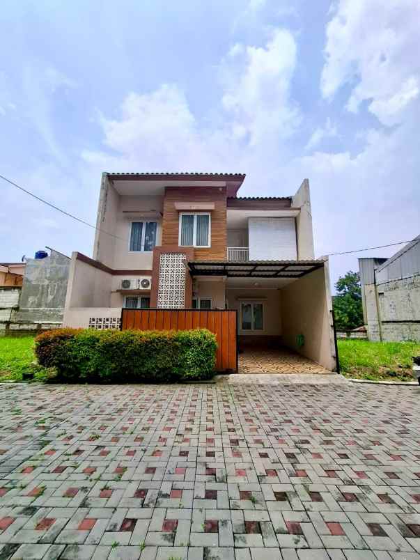 rumah semi furnished dalam cluster di jatimurni bekasi