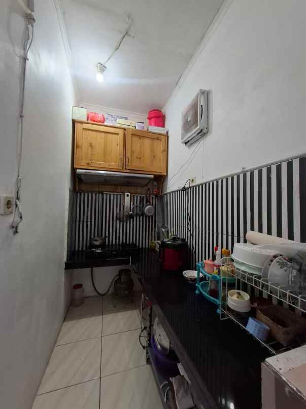 rumah semi furnished dalam cluster di jatimurni bekasi