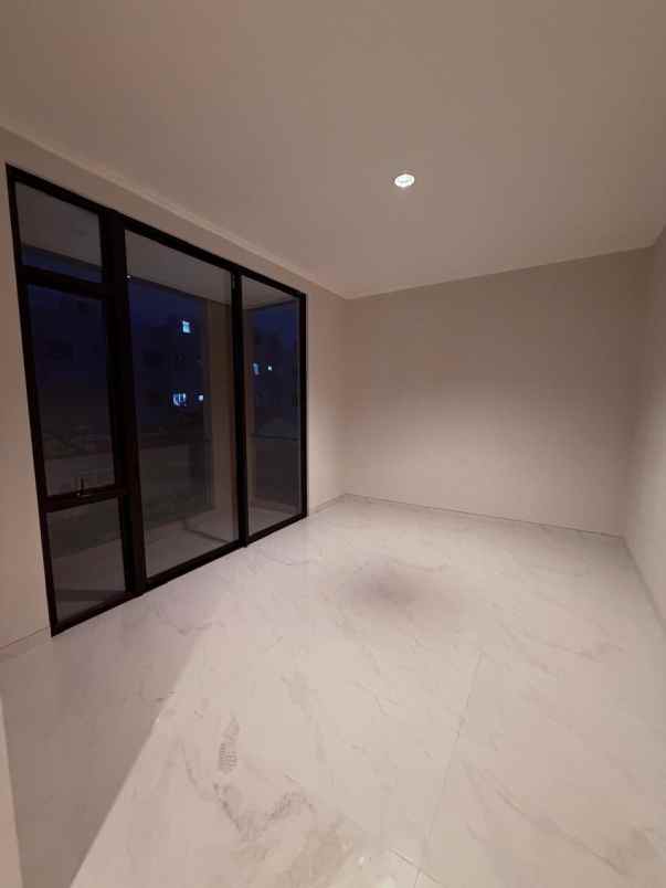 sewa rumah cluster kuningan village pik