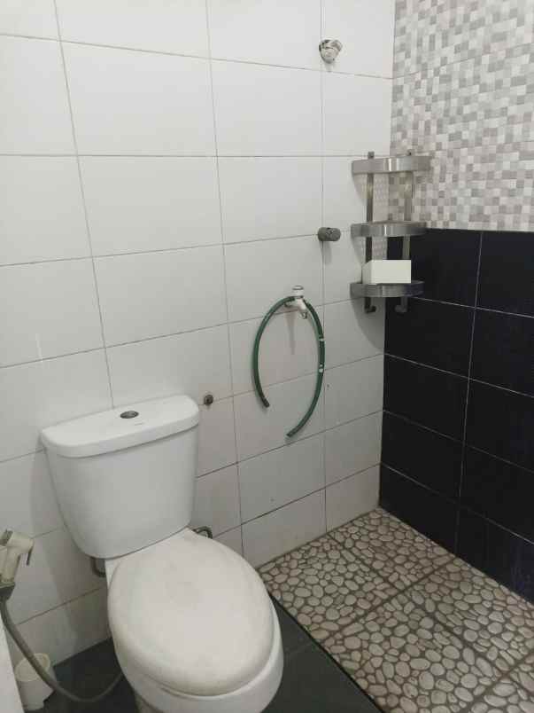 dijual rumah 2 lantai siap huni cluster graha raflesia