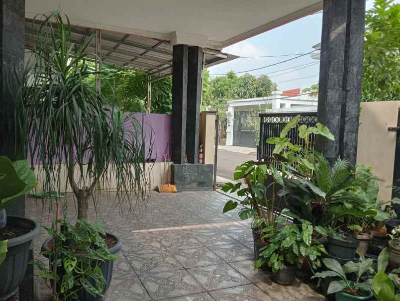 dijual rumah dianggrek loka graha raya
