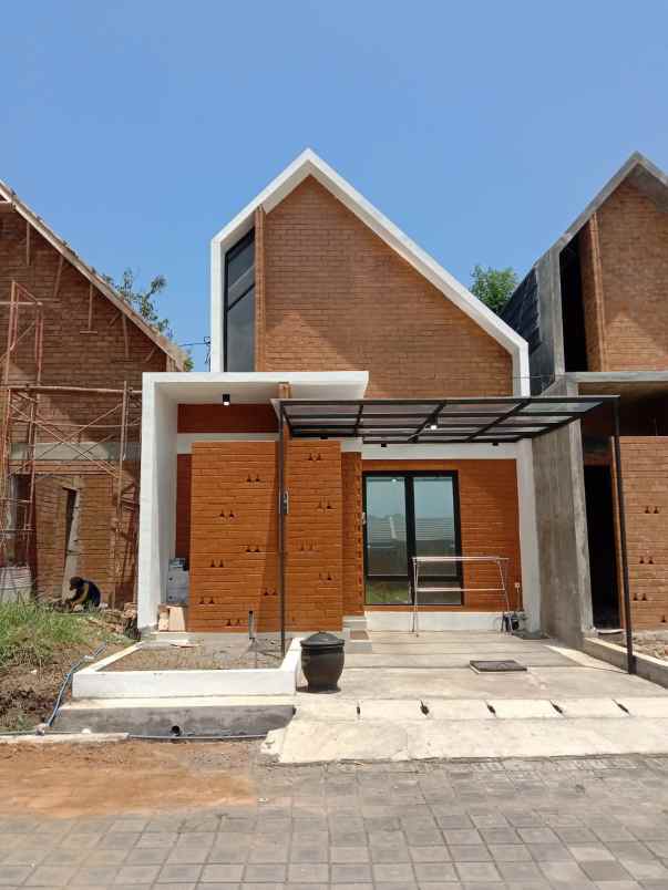 dijual rumah jalan raya telang timur