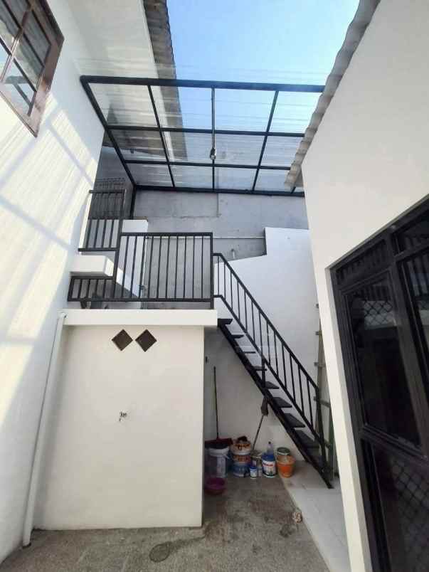 dijual rumah jalan wiguna