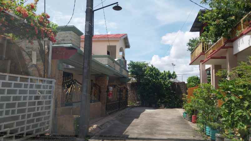dijual rumah jl surya lestari