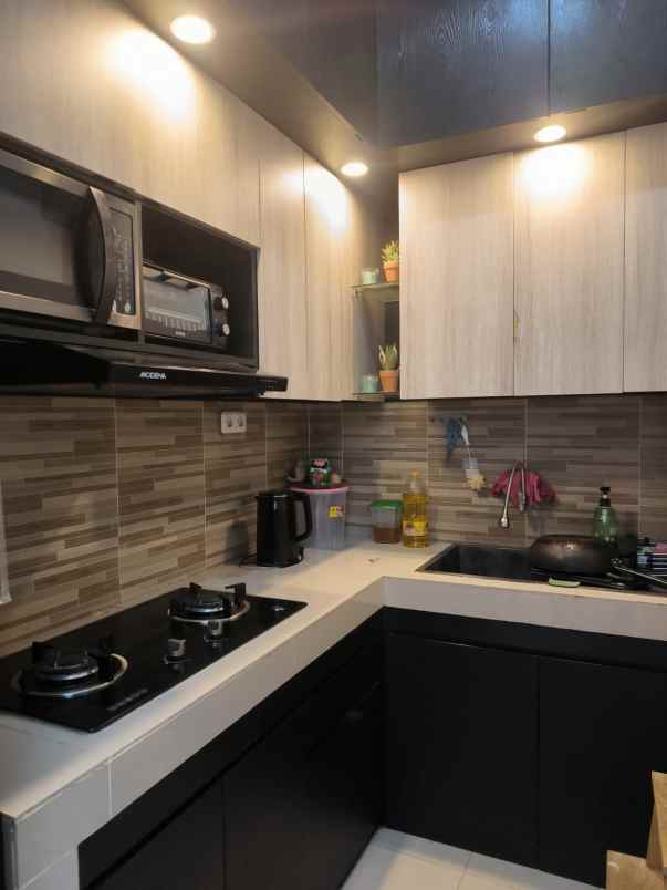 dijual rumah komplek bali garden city view