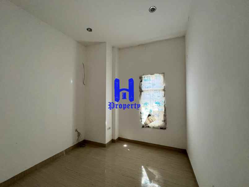 dijual rumah komplek medan resort city