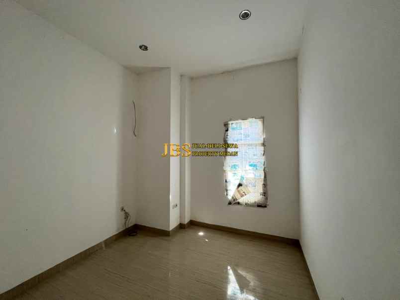 dijual rumah komplek medan resort city